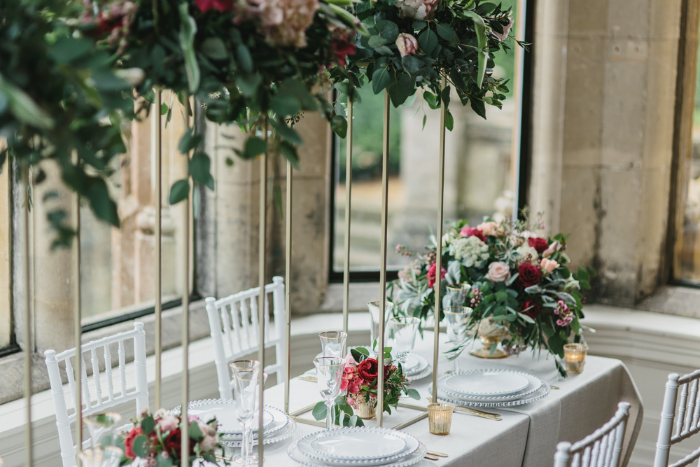 Blush and burgundy wedding, elegant wedding, blush and burgundy wedding tablescape, tall floral arrangement, floral installation, creative wedding flowers, top table ideas