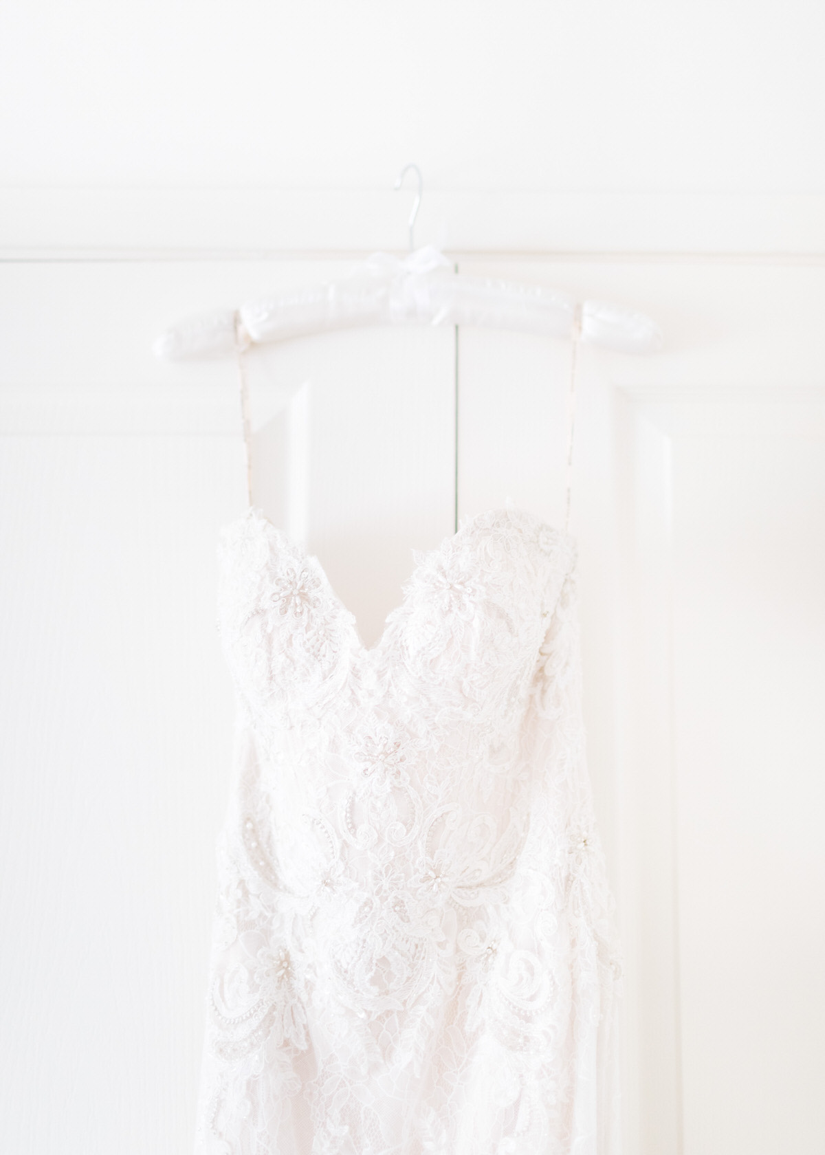 Wedding dress hanging up, lace wedding dress, fitted wedding dress, bridal prep, wedding morning, wedding dress inspiration